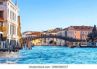 View of Grand Canal and Ponte dell Accademia bridge in Venice. The Ponte dell'Accademia is bridge to span the Grand Canal in Venice, Italy.  - Powered by Shutterstock