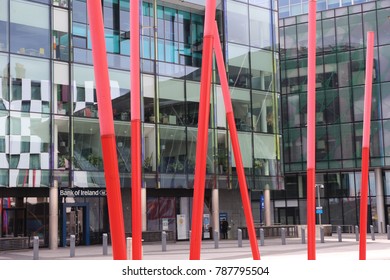 View Of The Grand Canal Theater Of Dublin Ireland Also Called The Bord Gáis Energy Theatre. Red Fine Columns Are Placed In The Ground Of The Place. The Picture Has Been Taken On 6th August 2016.