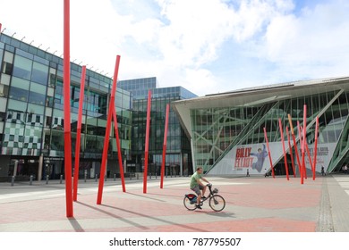 View Of The Grand Canal Theater Of Dublin Ireland Also Called The Bord Gáis Energy Theatre. Red Fine Columns Are Placed In The Ground Of The Place. The Picture Has Been Taken On 6th August 2016.