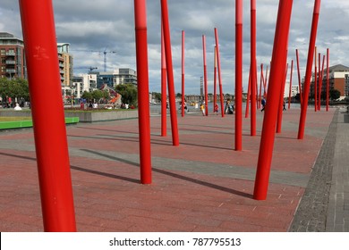 View Of The Grand Canal Theater Of Dublin Ireland Also Called The Bord Gáis Energy Theatre. Red Fine Columns Are Placed In The Ground Of The Place. The Picture Has Been Taken On 6th August 2016.