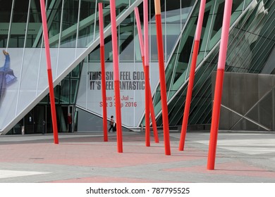 View Of The Grand Canal Theater Of Dublin Ireland Also Called The Bord Gáis Energy Theatre. Red Fine Columns Are Placed In The Ground Of The Place. The Picture Has Been Taken On 6th August 2016.