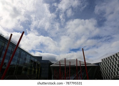 View Of The Grand Canal Theater Of Dublin Ireland Also Called The Bord Gáis Energy Theatre. Red Fine Columns Are Placed In The Ground Of The Place. The Picture Has Been Taken On 6th August 2016.