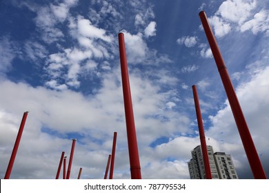 View Of The Grand Canal Theater Of Dublin Ireland Also Called The Bord Gáis Energy Theatre. Red Fine Columns Are Placed In The Ground Of The Place. The Picture Has Been Taken On 6th August 2016.