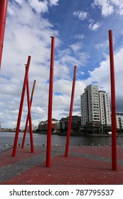 View Of The Grand Canal Theater Of Dublin Ireland Also Called The Bord Gáis Energy Theatre. Red Fine Columns Are Placed In The Ground Of The Place. The Picture Has Been Taken On 6th August 2016.