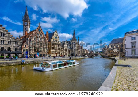 View of Graslei, Korenlei quays and Leie river in the historic city center in Ghent (Gent), Belgium. Architecture and landmark of Ghent. Cityscape of Ghent.