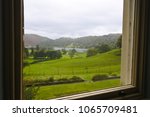 A view of Grasmere through a window at the Allan Bank House where Wordsworth once lived.