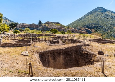 A view of a Grave Circle in front of the archaeological site of Mycenae in Greece in early summertime