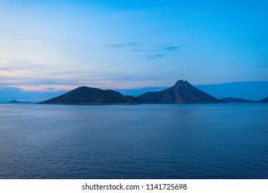 View of the Greek island of Atokos from the ferry at sunset. Greek islands in the Ionian Sea