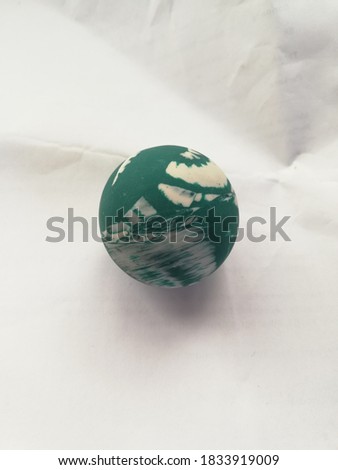 view of green ball with white strike