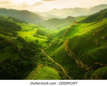 View of the green mountains and hills at sunset. Beautiful summer landscape. Aktoprak Pass in North Caucasus, Russia.  - Powered by Shutterstock