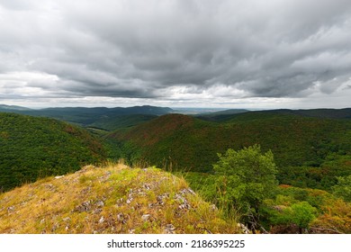 View Of Green Valley From Mountain Top On A Stormy Day