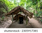 view of the guerrilla camp at Cu Chi tunnels were the location of several military campaigns during the Vietnam War, is now touristic destination. Travel concept.