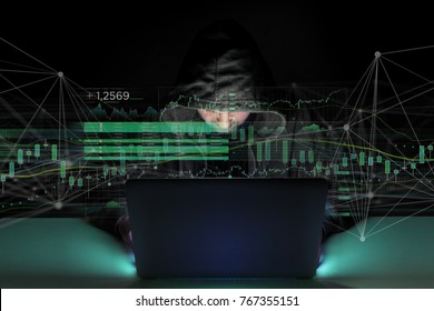 View of a Hacker man in the dark using computer to hack data and information system