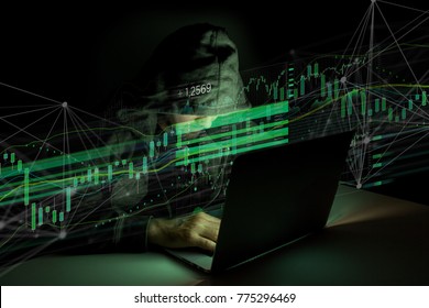 View of a Hacker man in the dark using computer to hack data and information system