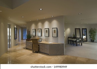 View of hallway along partition desk in luxury and modern home - Powered by Shutterstock