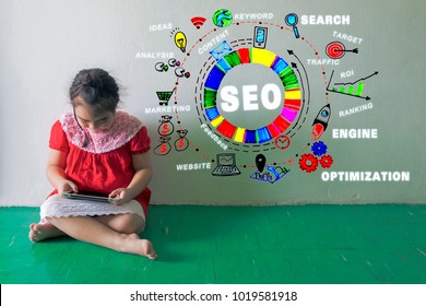 View of hand drawn icons,SEO Search Engine Optimization Internet Digital Concept,the form of text internet protocol technology,Girls are searching for knowledge from the tablet. - Powered by Shutterstock