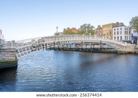 View of Hapenny Bridge over Liffey river in Dublin, Ireland
