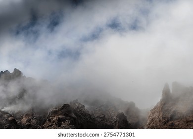 A view from a helicopter down into acrid smoke from active Soufriere Hills volcano on the island of Montserrat on a bright sunny day