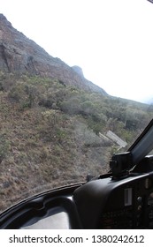 view from helicopter trees mountain and sky