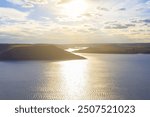 view from high coast to the wide river at the sunset