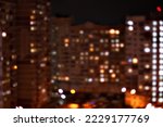 View from the high-rise window to the night city after the rain, bokeh, blurred focus, background, banner