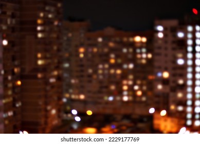 View from the high-rise window to the night city after the rain, bokeh, blurred focus, background, banner - Shutterstock ID 2229177769