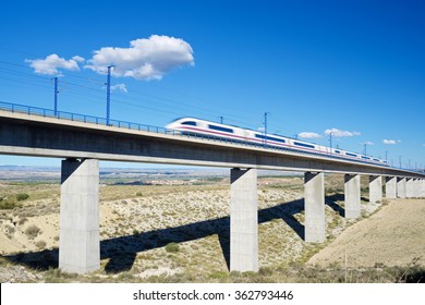 view of a high-speed train crossing a viaduct in Roden, Zaragoza, Aragon, Spain. AVE Madrid Barcelona.