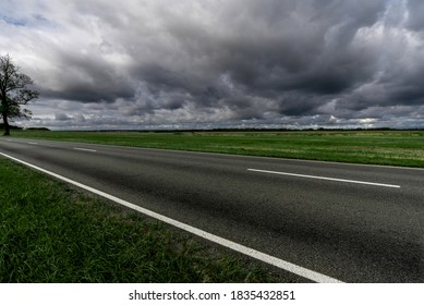 View of the highway in cloudy weather. Countryside road.