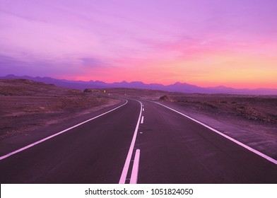 View Of The Highway At Sunset Time. Atacama Desert. Chile