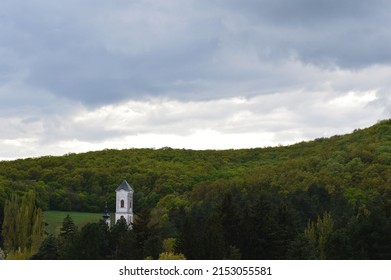 View From The Hill On The Detail Of Touristic Village Vrdnik-Serbia, Monastery, Spiritual, Historical And Cultural Treasure. The Sky Filled With Clouds. A Early Spring Day.