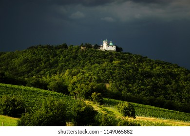 View of a hill-top monastery in the Austrian wine country near Vienna on the breathtaking Kahlenberg Hill against dark storm clouds.
Famous European wine region landscape