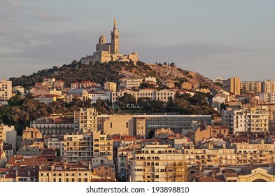 View of the historic church "Notre Dame de la Garde" of Marseille in South France during sunset