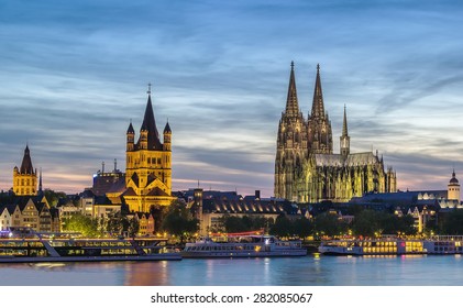 view of historical center of Cologne from Rhine river in evening, Germany
