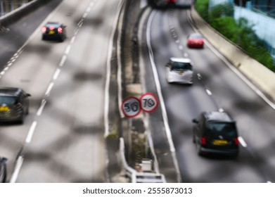 The view of Hong Kong cityscape, Looking from chain link fence. Street scene, modern city. Hong Kong city. Travel and city concept. - Powered by Shutterstock