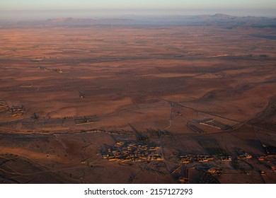 The View From A Hot Air Balloon Down To The Desert And Villages Near Marrakech At Sunrise, April, Morocco