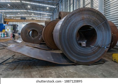 View Of The Hot Rolled Carbon Steel Plate Coils To Make Spiral Welded Pipe (strips, Rolls, Sheets) In The Metal Factory. 