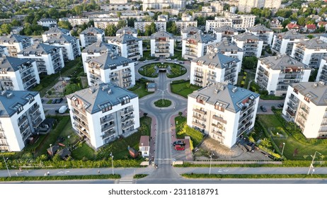 A view of the housing estate during the summer. housing market concept concept. - Shutterstock ID 2311818791