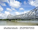 A View of Howrah bridge and Holy Ganga River from Mullick Ghat