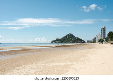 View of Hua Hin beach and calm sea during the day in summer of Thailand - Shutterstock ID 2200893623