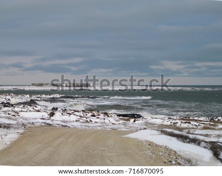 View of the Hudson Bay near Churchill; Prince of Wales Fort in the background (mid left at horizon)