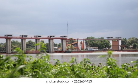 View Of A Hydroelectric Power Plant Dam Bridge During Cloudy Weather In Blitar, East Java, Indonesia In April 2022