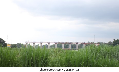 View Of A Hydroelectric Power Plant Dam Bridge During Cloudy Weather In Blitar, East Java, Indonesia In April 2022