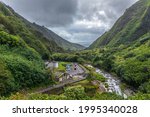 View of Iao Valley near Wailuku in West Maui, Hawaii. The lush rainforest around this state park is Hawaii