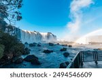 View of the Iguazu Falls, border between Brazil and Argentina. The falls are one of the seven wonders of the world and are located in the Iguaçu National Park, a UNESCO World Heritage Site.