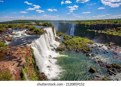 View Of The Iguazu Falls, Border Between Brazil And Argentina. The Falls Are One Of The Seven Wonders Of The World And Are Located In The Iguaçu National Park, A UNESCO World Heritage Site.