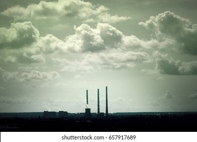 View of the industrial city and the sky with clouds - Shutterstock ID 657917689