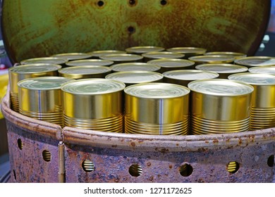 View Of An Industrial Food Canning Machine In A Cannery Factory