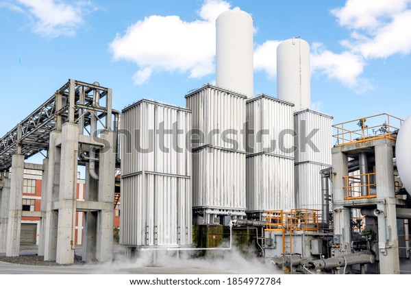 View of the industrial oxygen tanks in the chemical\
plant. It is an oxygen storage vessel, which is either held under\
pressure in gas cylinders, or as liquid oxygen in a cryogenic\
storage tank.