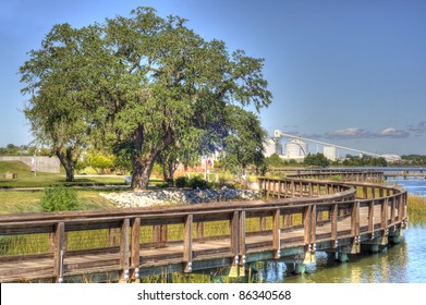 View Of Industry From Riverfront Park In North Charleston, SC In HDR Style.