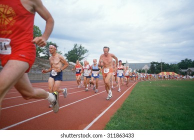 View From Infield Of Runners At The Senior Olympics In St. Louis, Missouri